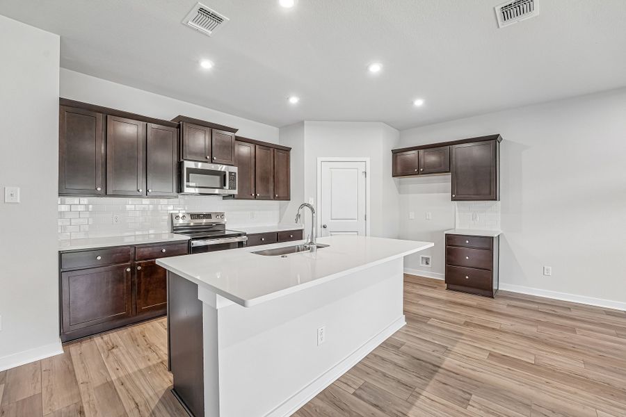 Representative furnished interior of a home built from the Warrior by Omega Builders in Grove East, Temple (Image 6).