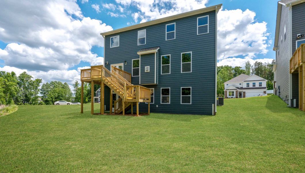 Front exterior of a new home in Whitehawk Meadows, Travelers Rest, SC, highlighting curb appeal (Image 2). Front exterior of a new home in Whitehawk Meadows, Travelers Rest, SC, highlighting curb appeal (Image 2).