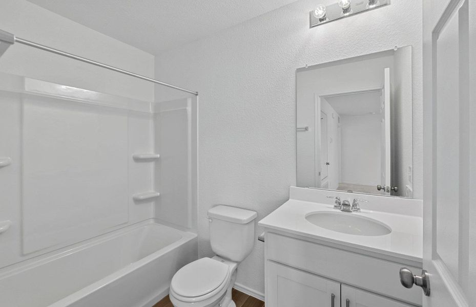 Furnished interior view inside a new home in Santa Rita Ranch, Liberty Hill (Image 11). Furnished interior view inside a new home in Santa Rita Ranch, Liberty Hill (Image 11).