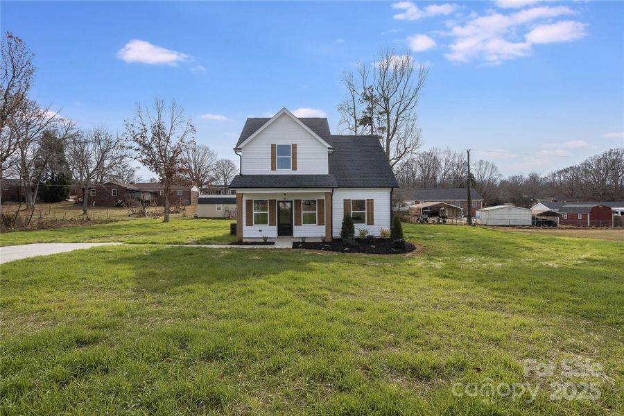 Front exterior of a new home in , Kings Mountain, NC, highlighting curb appeal (Image 1).