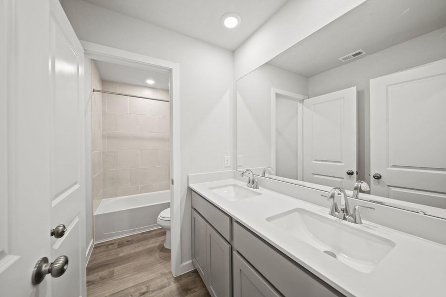 Furnished interior view inside a new home in Valor Park, Bay City (Image 3). Furnished interior view inside a new home in Valor Park, Bay City (Image 3).