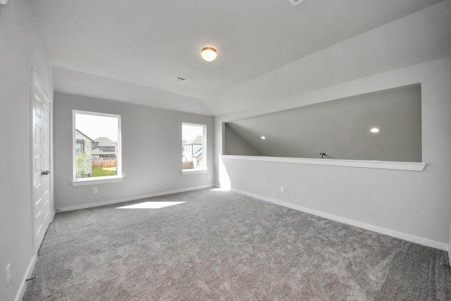 Ascend to relaxation in this fantastic game room! Ideal for both casual gatherings and adult gaming, it boasts plush carpet, lofty ceilings, custom paint, and ample windows for abundant natural light. Ascend to relaxation in this fantastic game room! Ideal for both casual gatherings and adult gaming, it boasts plush carpet, lofty ceilings, custom paint, and ample windows for abundant natural light.