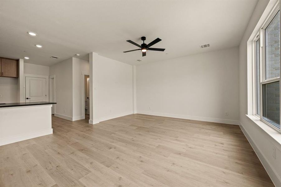 This spacious, light filled family room is the perfect place to host friends and family! This spacious, light filled family room is the perfect place to host friends and family!