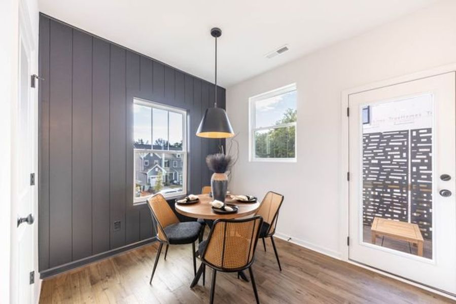 Representative furnished interior of a home built from the Myka TH by True Homes in Village at Reedy Creek Townhomes, Charlotte (Image 6).