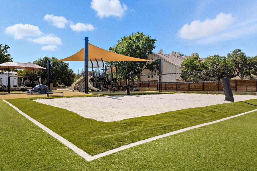 View of home's community with volleyball court