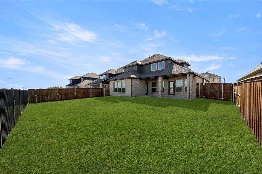 Exterior details and patio area of a home in Polo Ridge, Forney (Image 26).