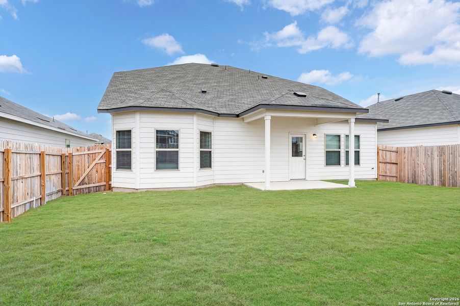Exterior details and patio area of a home in Winding Brook, San Antonio (Image 21).