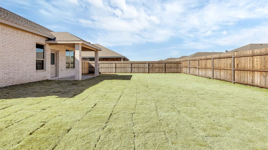 Exterior details and patio area of a home in Viridian, Lubbock (Image 15).