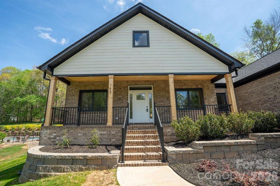 Front exterior of a new home in , Dallas, NC, highlighting curb appeal (Image 1). Front exterior of a new home in , Dallas, NC, highlighting curb appeal (Image 1).