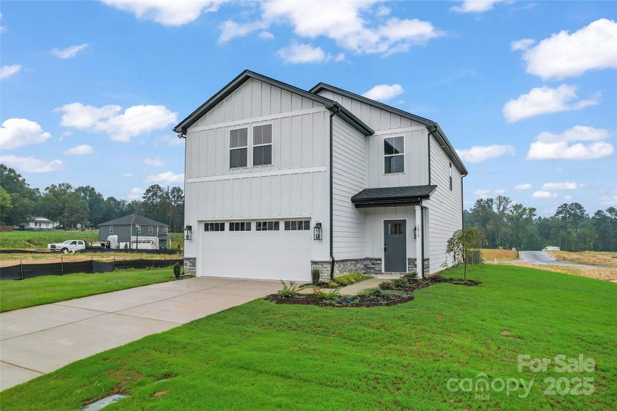 Front exterior of a new home in , Kannapolis, NC, highlighting curb appeal (Image 15). Front exterior of a new home in , Kannapolis, NC, highlighting curb appeal (Image 15).