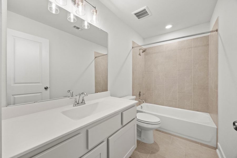 Furnished interior view inside a new home in Parmer Ranch - 60', Georgetown (Image 9).