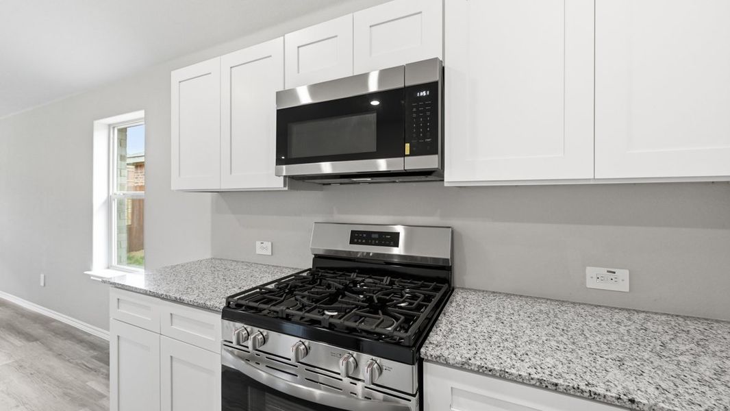 Representative furnished interior of a home built from the Dalton by D.R. Horton in Rock Creek West, Fort Worth (Image 11).
