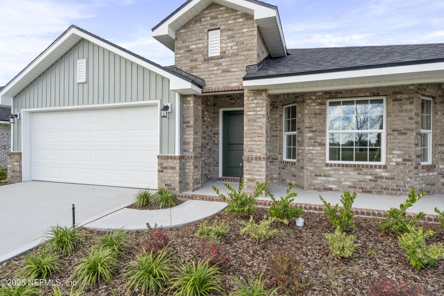 Exterior details and patio area of a home in Shadow Crest at Rolling Hills, Green Cove Springs (Image 3). Exterior details and patio area of a home in Shadow Crest at Rolling Hills, Green Cove Springs (Image 3).