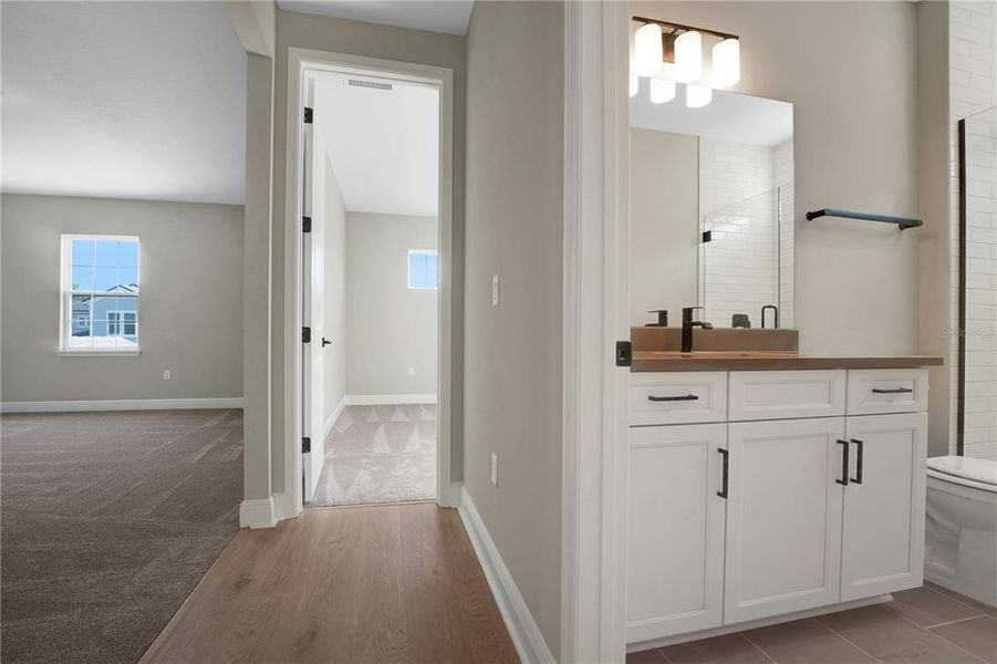 Furnished interior view inside a new home in Palms at Windermere, Windermere (Image 17). Furnished interior view inside a new home in Palms at Windermere, Windermere (Image 17).