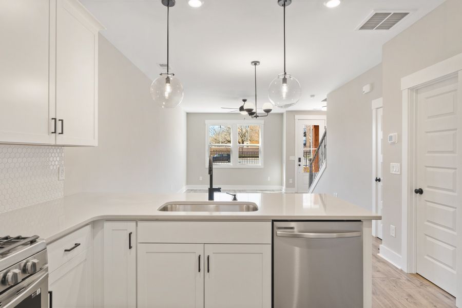 Representative furnished interior of a home built from the Holland by Hunter Quinn Homes in Renaissance Place, Greenville (Image 15).