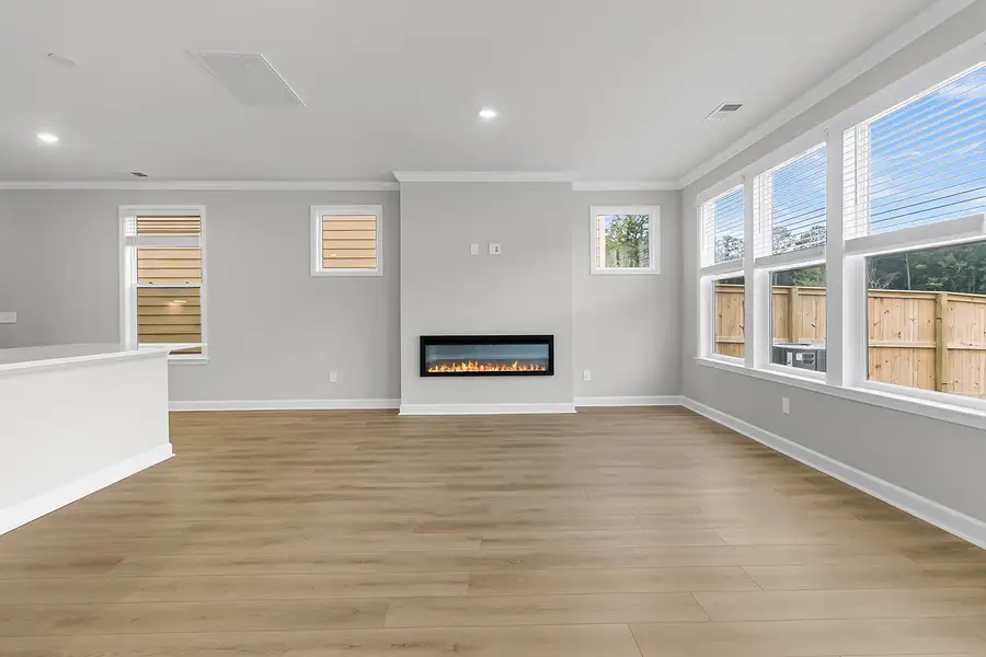 Spacious, unfurnished interior of a new home in Pineland Preserve, Summerville (Image 22).
