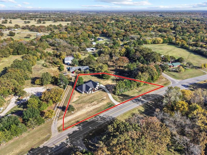 Front exterior of a new home in , Denison, TX, highlighting curb appeal (Image 2). Front exterior of a new home in , Denison, TX, highlighting curb appeal (Image 2).