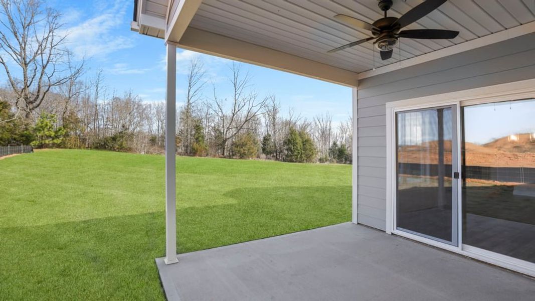 Exterior details and patio area of a home in Alder Pond, Campobello (Image 4).