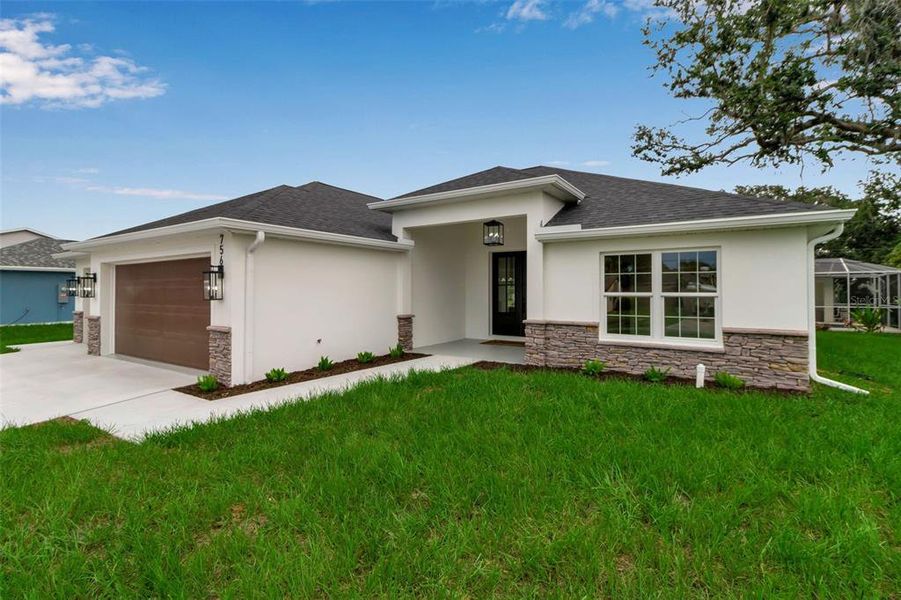 Front exterior of a new home in , Venice, FL, highlighting curb appeal (Image 36).