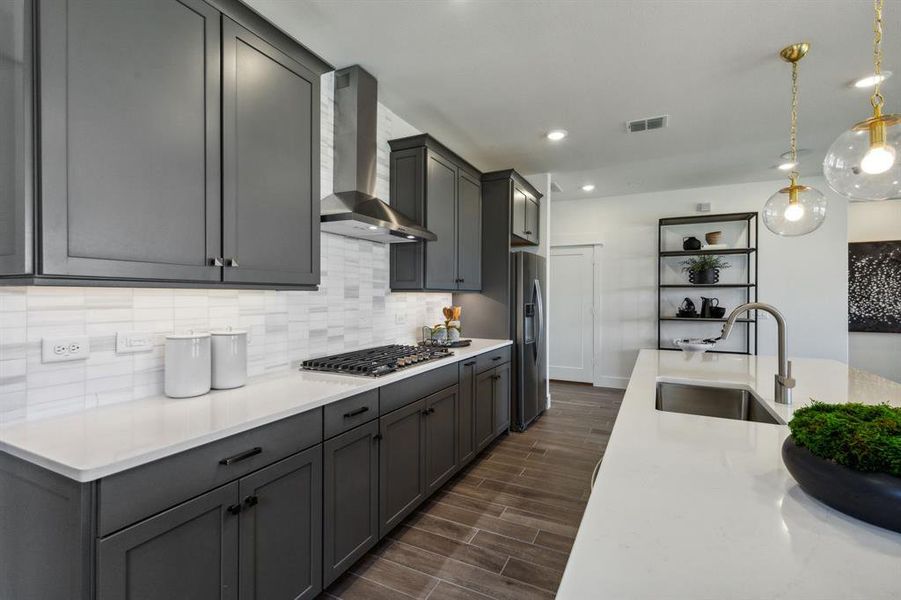 Model Representation* - Abundant cabinet space in kitchen