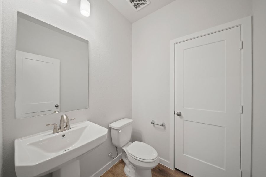 Furnished interior view inside a new home in Sunterra, Katy (Image 6).