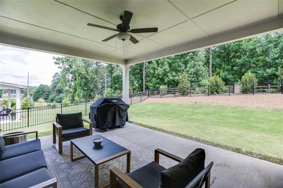 Exterior details and patio area of a home in Overlook at Lanier, Buford (Image 26).