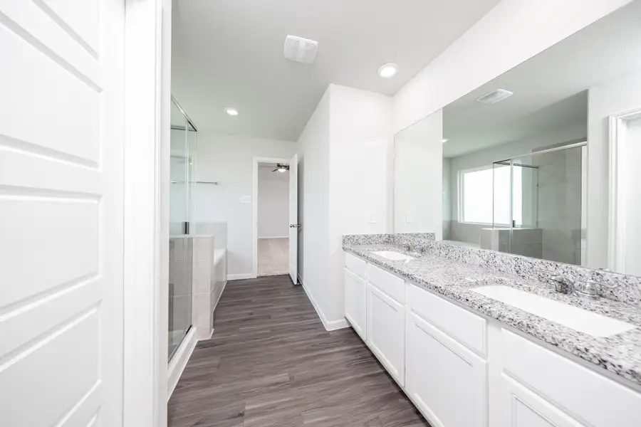 Furnished interior view inside a new home in Granger Pines, Conroe (Image 8).