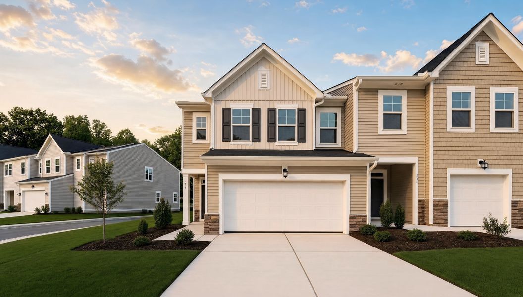 Front exterior of a new home in Parker Ridge Townes, Rolesville, NC, highlighting curb appeal (Image 1). Front exterior of a new home in Parker Ridge Townes, Rolesville, NC, highlighting curb appeal (Image 1).