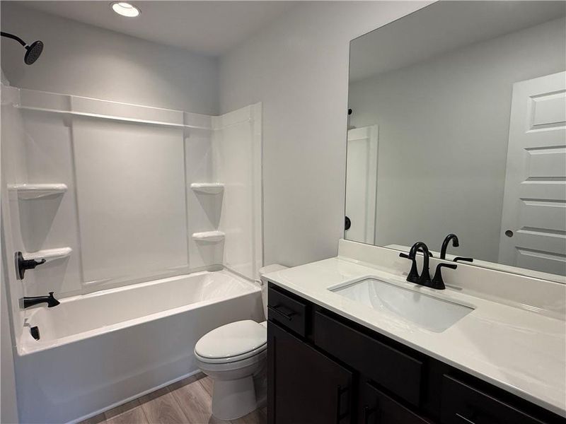 Furnished interior view inside a new home in The Towns at Auburn Station East, Auburn (Image 5).