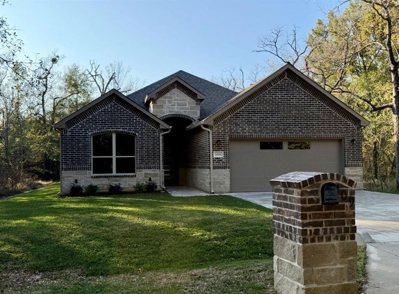 Front exterior of a new home in , Trinidad, TX, highlighting curb appeal (Image 1). Front exterior of a new home in , Trinidad, TX, highlighting curb appeal (Image 1).