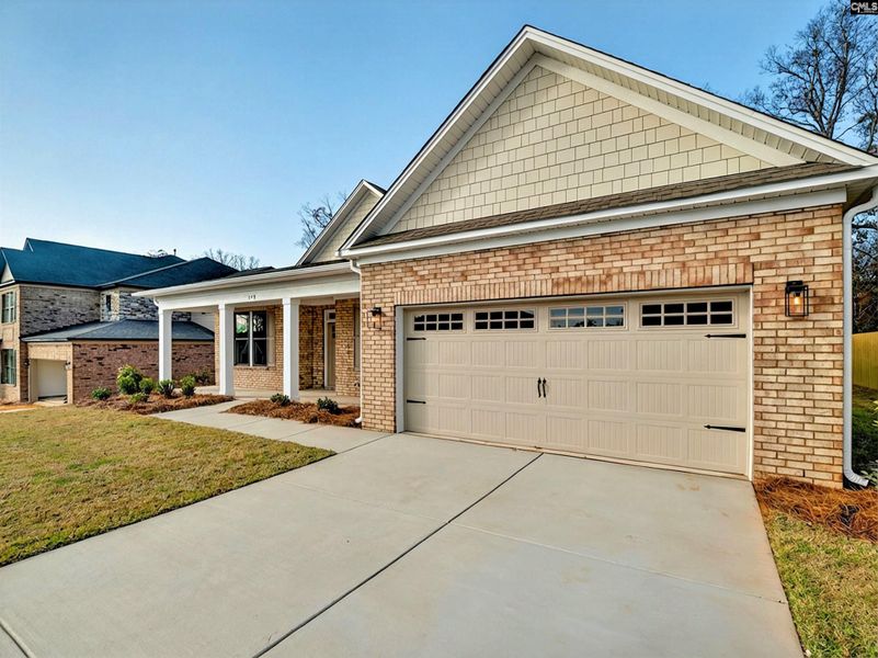 Front exterior of a new home in Collins Cove, Chapin, SC, highlighting curb appeal (Image 22).