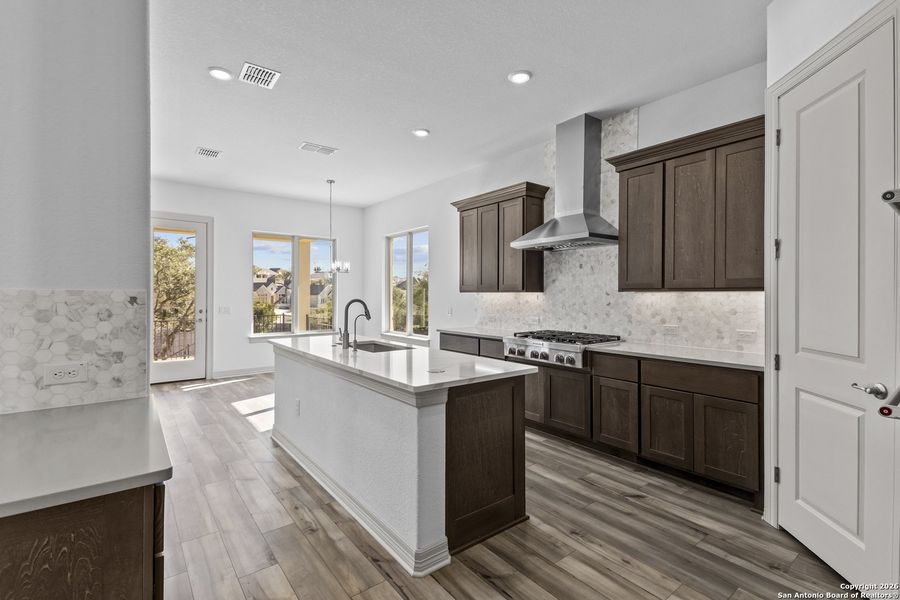 Furnished interior view inside a new home in Highland Estates, San Antonio (Image 14).