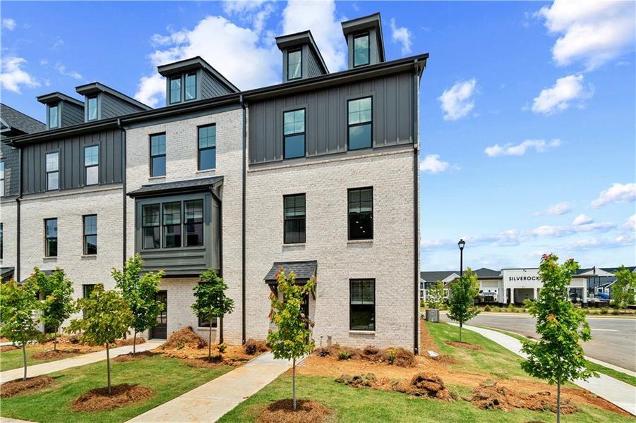 Front exterior of a new home in Silverock, McDonough, GA, highlighting curb appeal (Image 26).