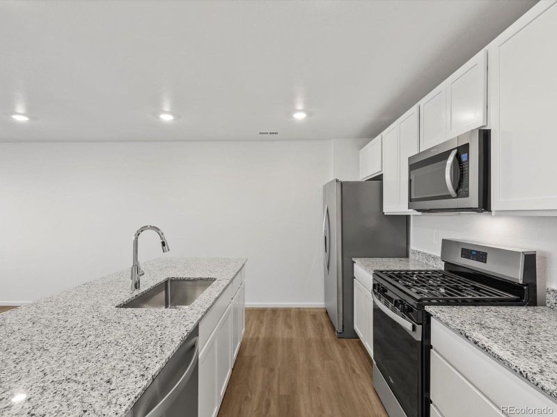 Furnished interior view inside a new home in Skyview at High Point, Aurora (Image 12).
