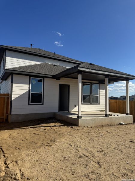 Exterior details and patio area of a home in Hickory Ridge, Elmendorf (Image 3).