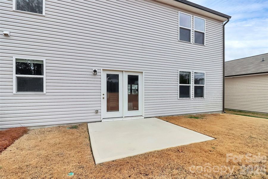 Exterior details and patio area of a home in Sunbriar, Charlotte (Image 26).