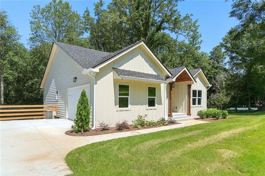 Front exterior of a new home in , Gainesville, GA, highlighting curb appeal (Image 2). Front exterior of a new home in , Gainesville, GA, highlighting curb appeal (Image 2).