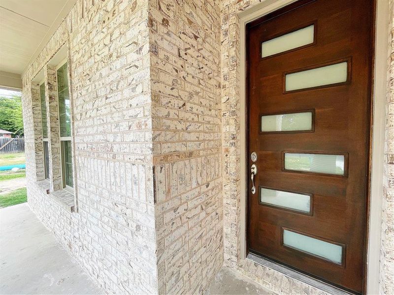 Modern front door and covered patio