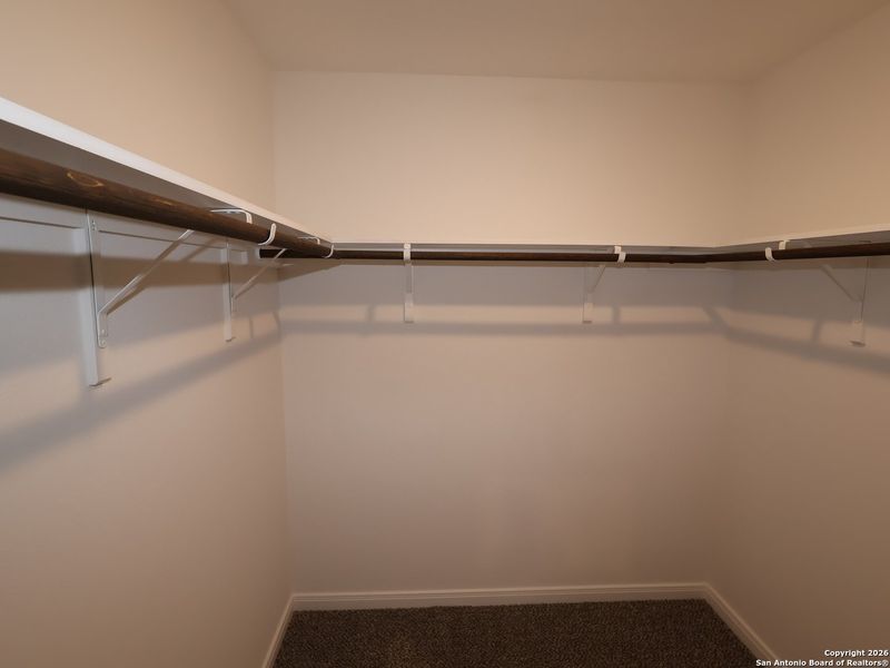 Spacious, unfurnished interior of a new home in Hunters Ranch, San Antonio (Image 23).