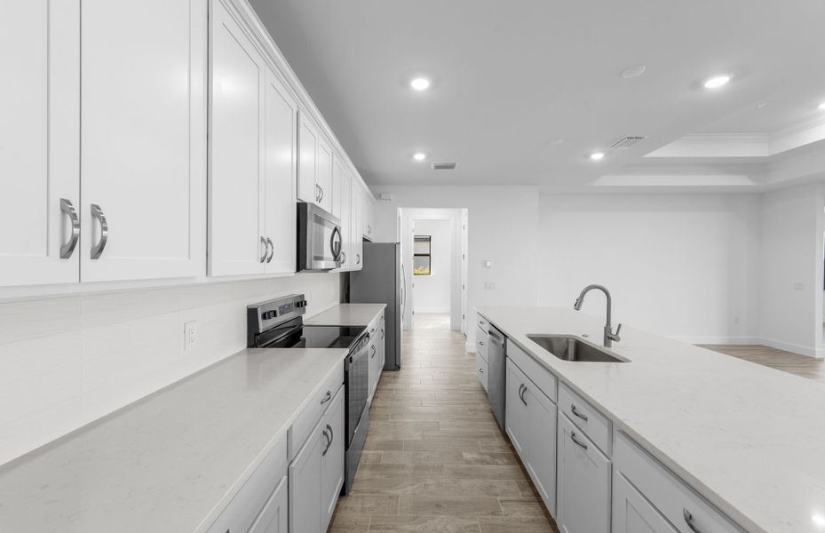 Furnished interior view inside a new home in Del Webb Naples, Ave Maria (Image 8).