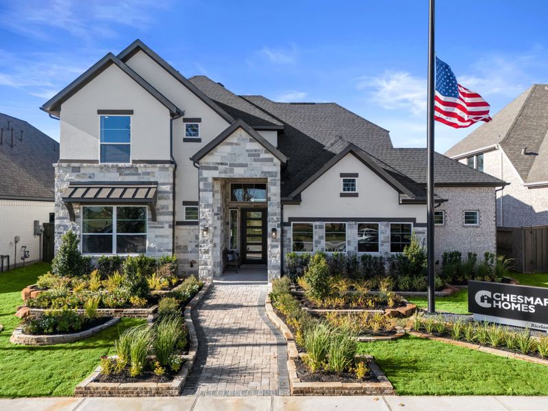 Front exterior of a new home in Brookewater, Rosenberg, TX, highlighting curb appeal (Image 23).