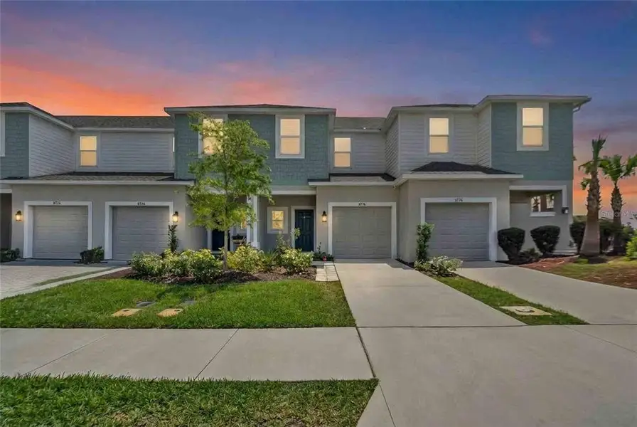 Front exterior of a new home in , Sarasota, FL, highlighting curb appeal (Image 1). Front exterior of a new home in , Sarasota, FL, highlighting curb appeal (Image 1).
