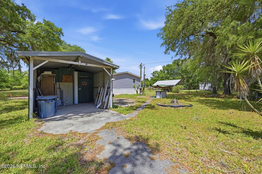Exterior details and patio area of a home in , Pomona Park (Image 18).