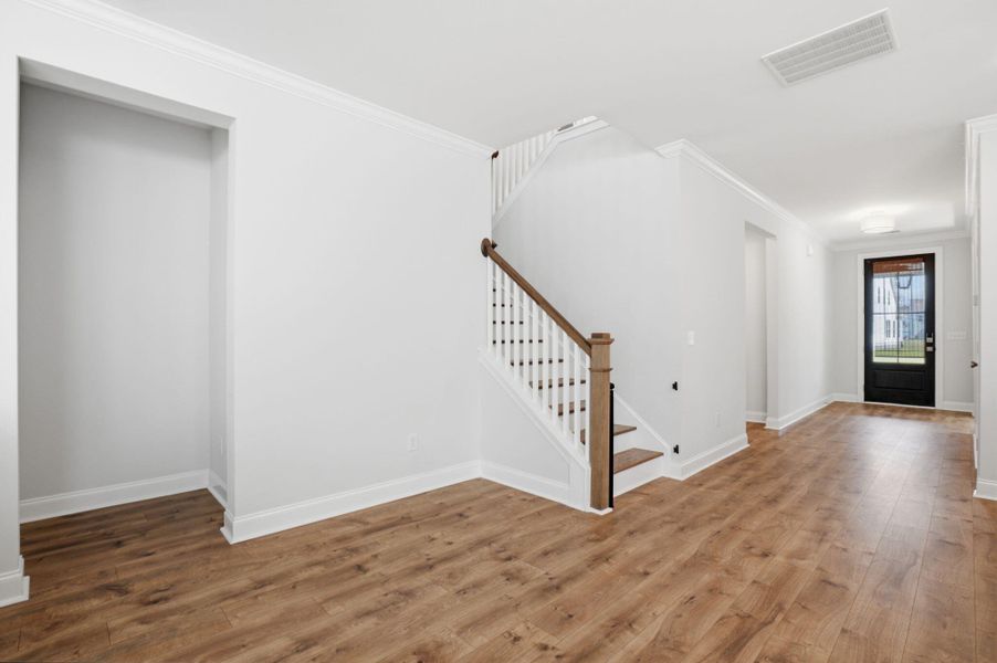Spacious, unfurnished interior of a new home in Tidewater at Lakes of Cane Bay, Summerville (Image 24).