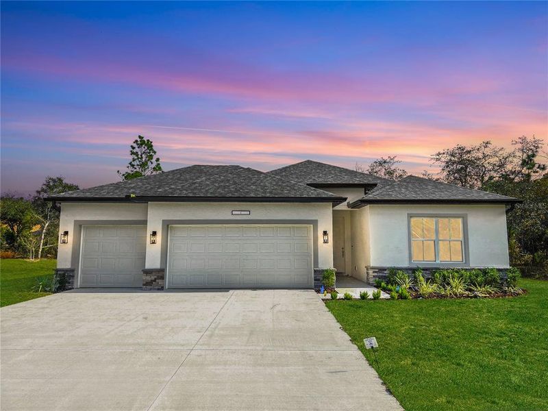 Front exterior of a new home in , Homosassa, FL, highlighting curb appeal (Image 1).