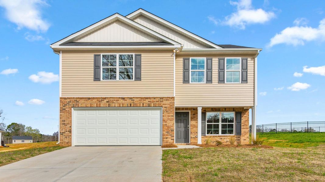 Front exterior of a new home in Hudson Glen, Mocksville, NC, highlighting curb appeal (Image 1).