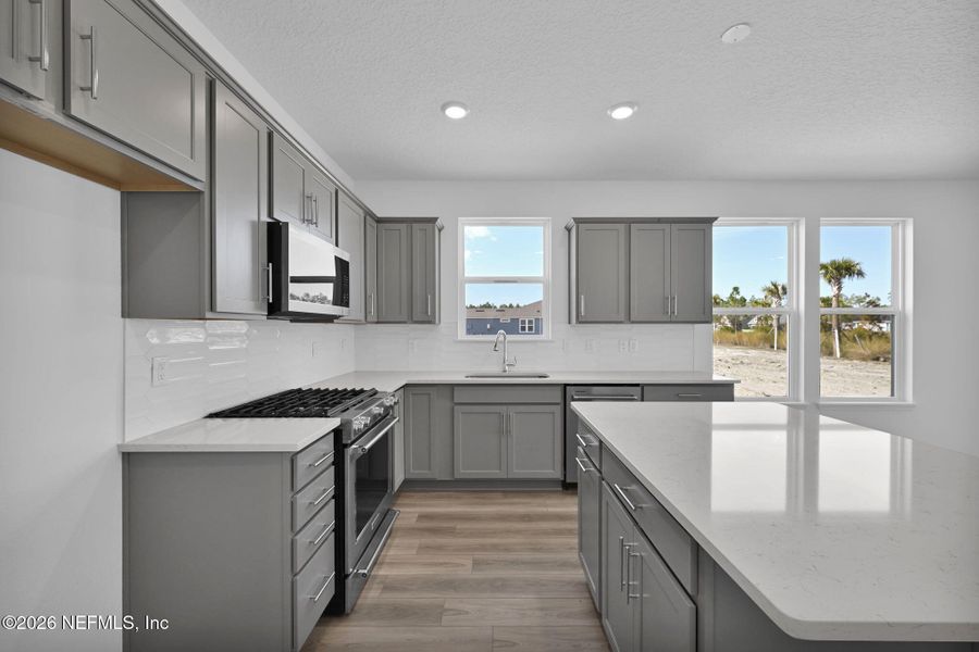Furnished interior view inside a new home in Del Webb Wildlight, Yulee (Image 12).