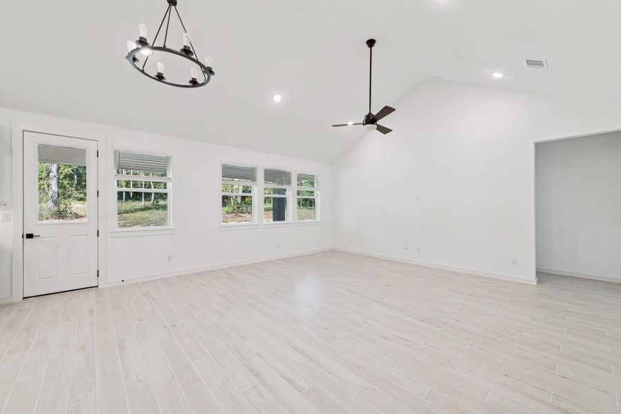 Open great room and dining area (*Photo not of actual home and used for illustration purposes only.) Open great room and dining area (*Photo not of actual home and used for illustration purposes only.)