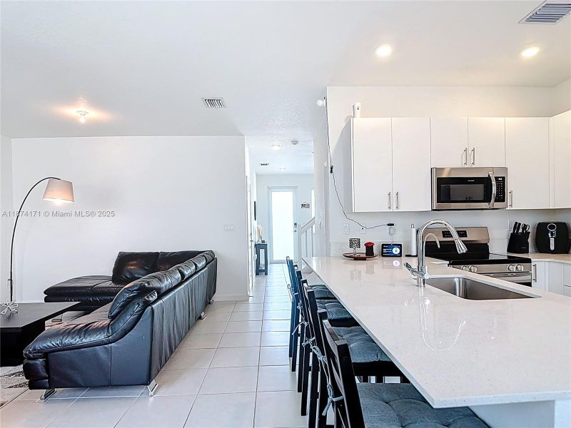 Furnished interior view inside a new home in , Homestead (Image 7). Furnished interior view inside a new home in , Homestead (Image 7).