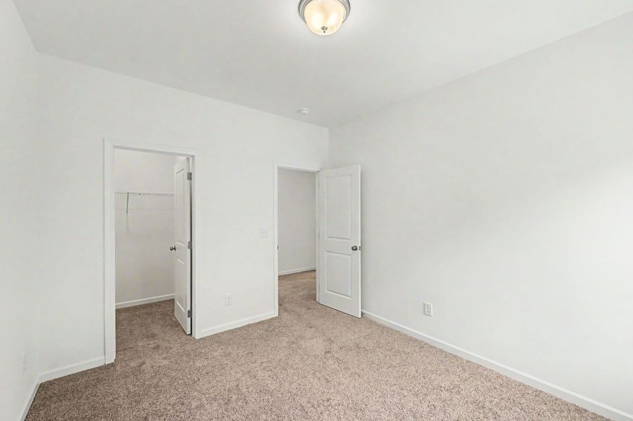 Spacious, unfurnished interior of a new home in Ironhorse, Dickson (Image 35).